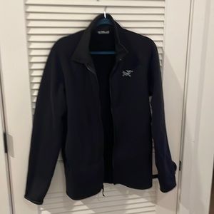 Black arcteryx fleece coat